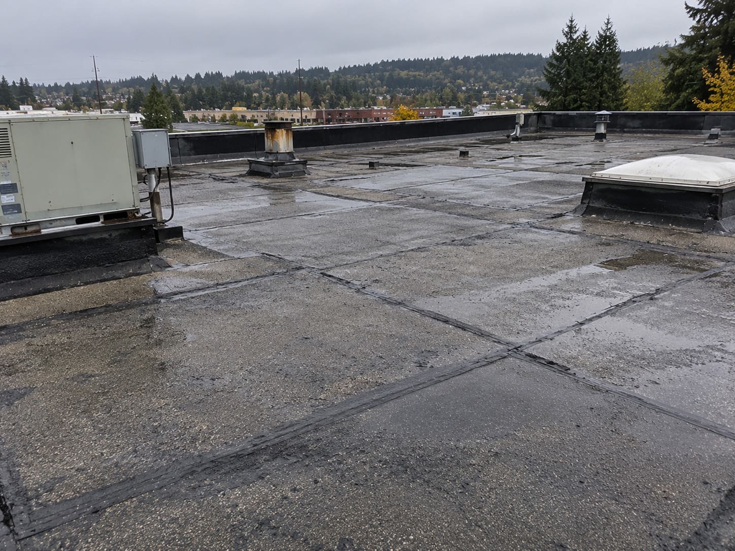 Built-up roof installation on a flat roof in Gresham, Oregon