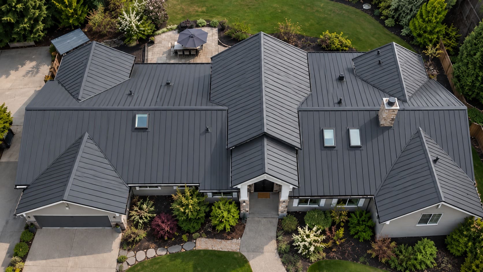 New asphalt shingle roof with ridge vents on a home in Gresham, Oregon