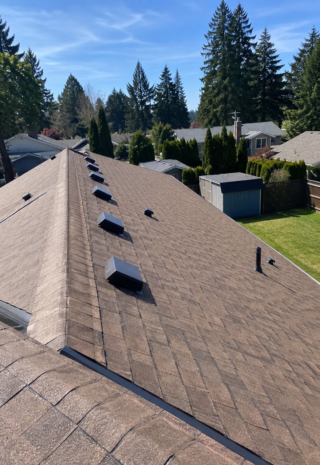 Restored asphalt shingle roof on a home in Gresham, Oregon