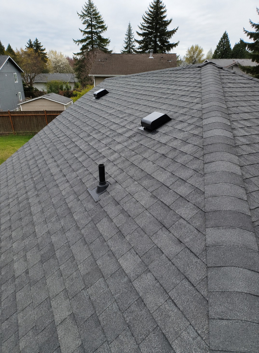 Gray asphalt shingle roof on a home in Gresham, Oregon