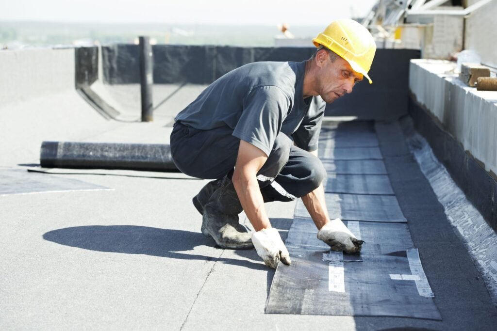 Commercial roofing crew working on a flat roof in Gresham, Oregon