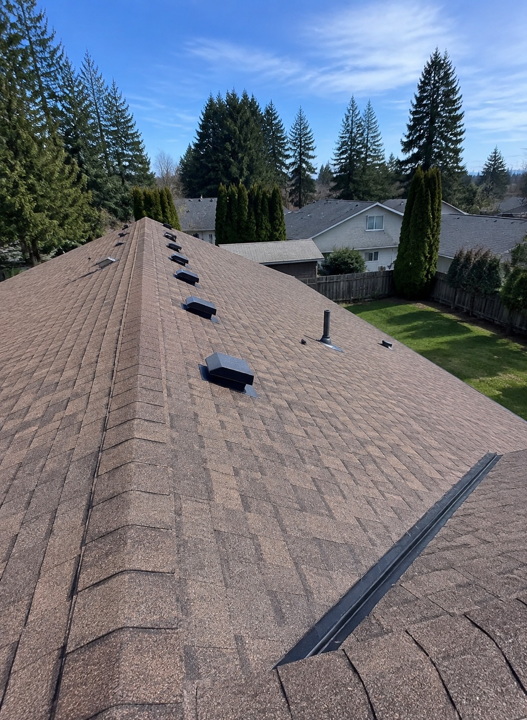 Newly installed asphalt shingle roof on a home in Gresham, Oregon